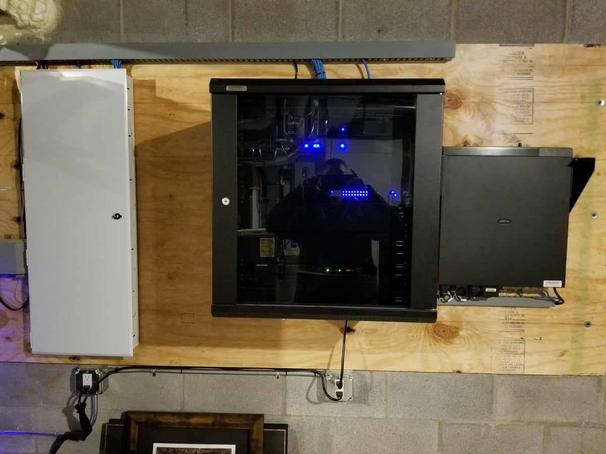 Wall-mounted network cabinet in a home