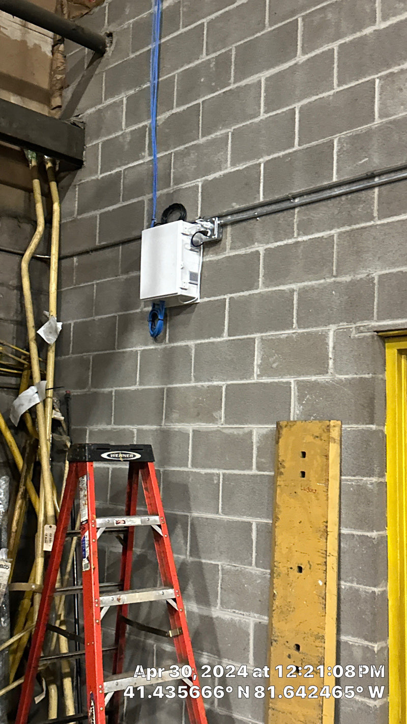 Network enclosure on a block wall
