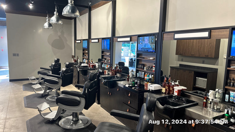 Row of grooming stations and TVs